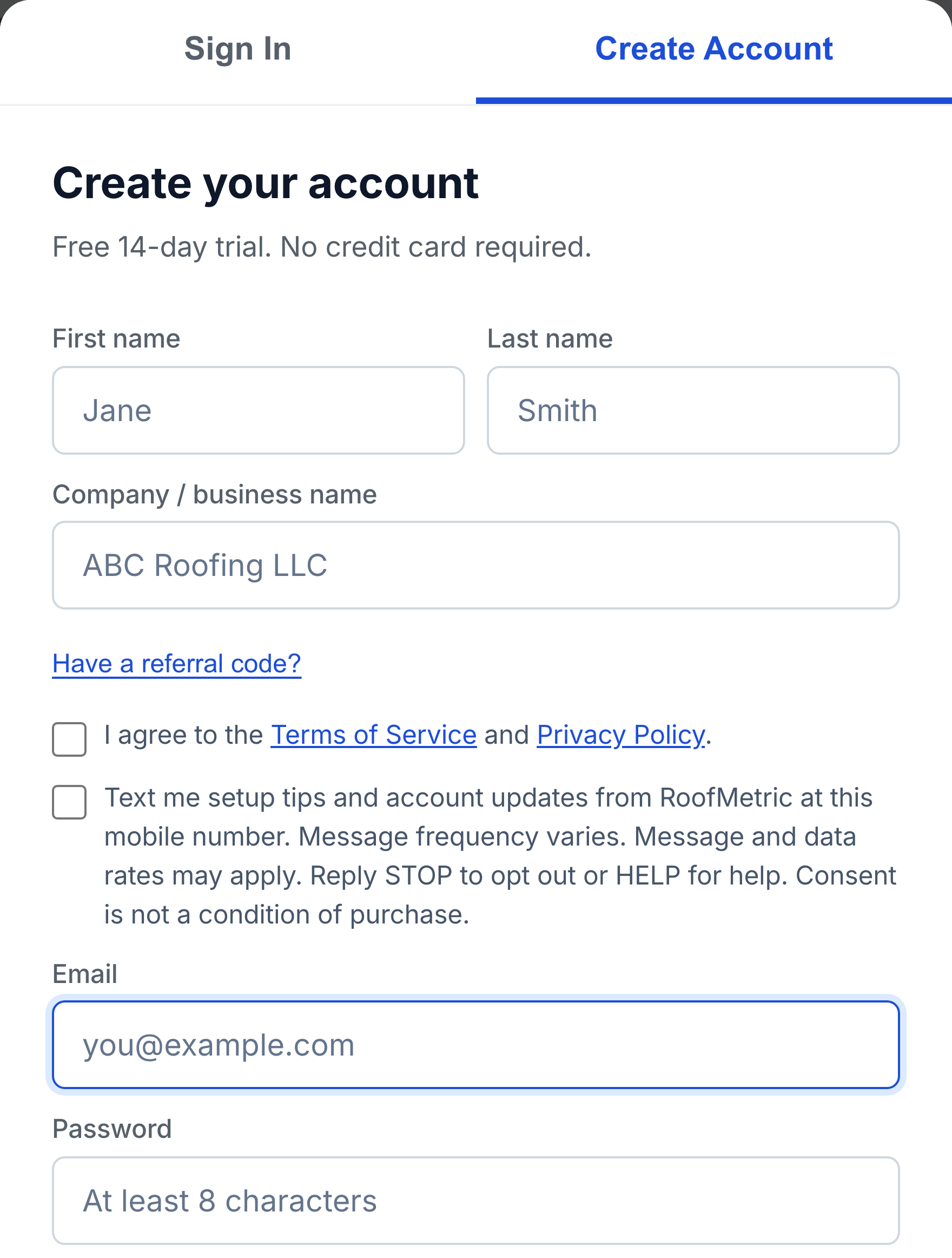 The RoofMetric Create Account form. The text message consent checkbox is present and unchecked.